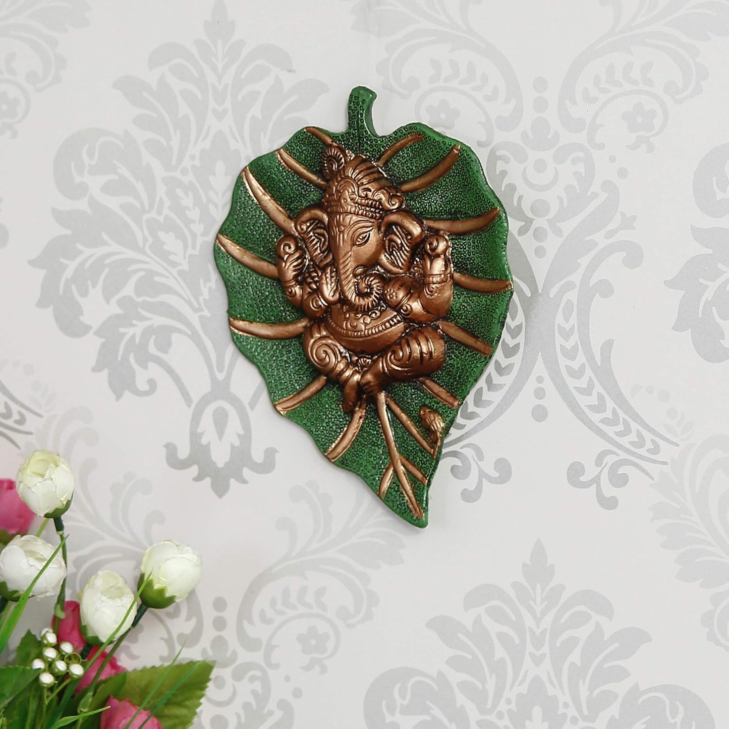 Metal Brown Lord Ganesha Idol On Green Leaf Ganesha Wall Hanging Decorative Showpiece for Wall Decor