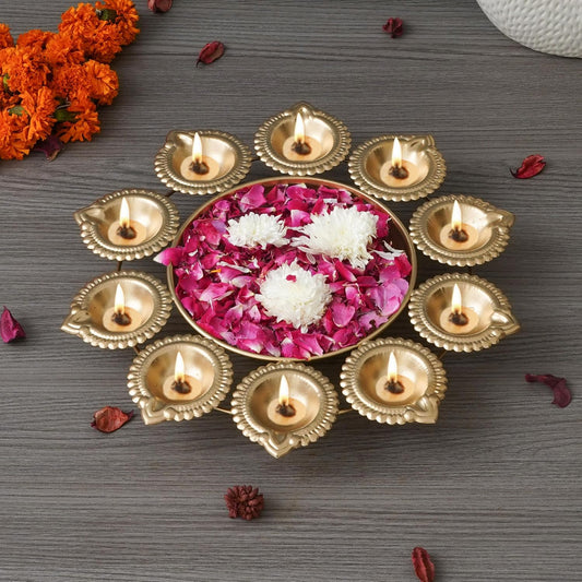 Golden Metal Handcrafted Flower Decorative Urli with 10 Diyas